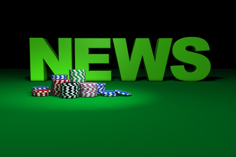 8414023-casino-chips-and-news-sign